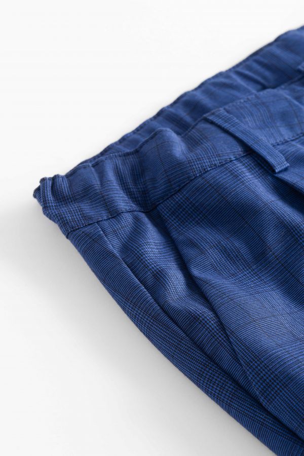 Spodnie tkaninowe eleganckie spodnie garniturowe granatowe w kratkę z kantem 2155342