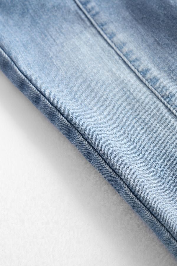 Spodnie jeansowe niebieskie z ozdobnym szwem TREGGINS 2156719