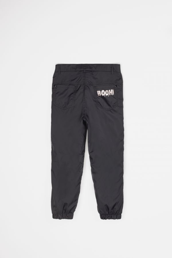 Spodnie tkaninowe czarne z odblaskowym nadrukiem i polarową podszewką 2200341