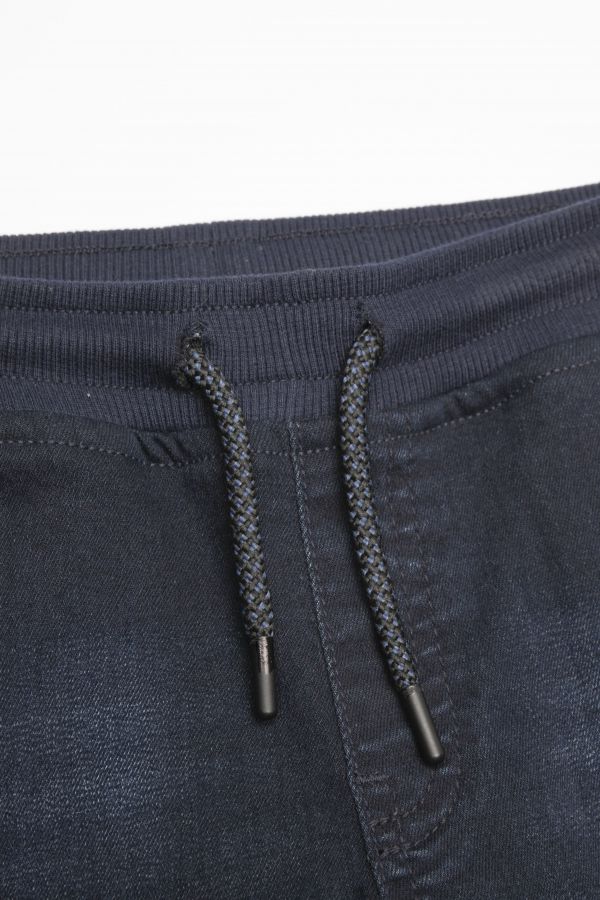 Spodnie jeansowe granatowe ze ściągaczami w nogawkach JOGGER 2112615