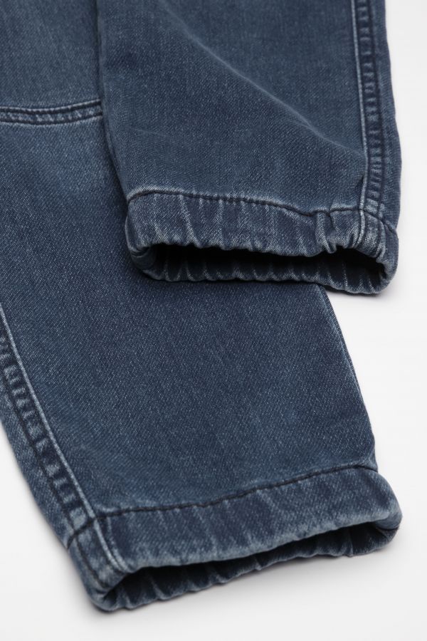 Spodnie jeansowe granatowe z wiązaniem w pasie o fasonie SLIM 2112683