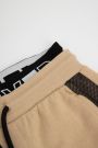 Spodnie dresowe beżowe z wstawkami z siatki o fasonie SLIM 2218511