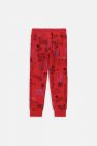 Spodnie dresowe czerwone z printem na całości o fasonie SLIM 2221085