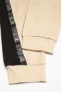 Spodnie dresowe beżowe z ozdobnymi taśmami 2111637