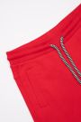Spodnie dresowe czerwone gładkie wiązane w pasie o fasonie SLIM 2111824